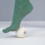 Bloom white ball under a foot